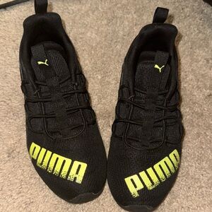 Puma Black kids Sneakers with Vibrant Yellow Logo